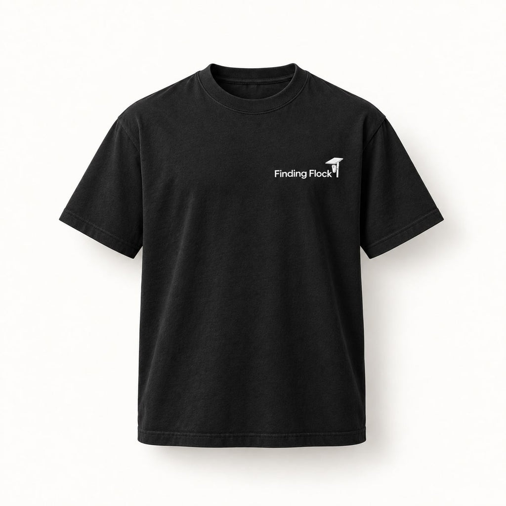 Deflock Halloween Part I Tee in Black, front of the shirt showing the small left-chest wordmark