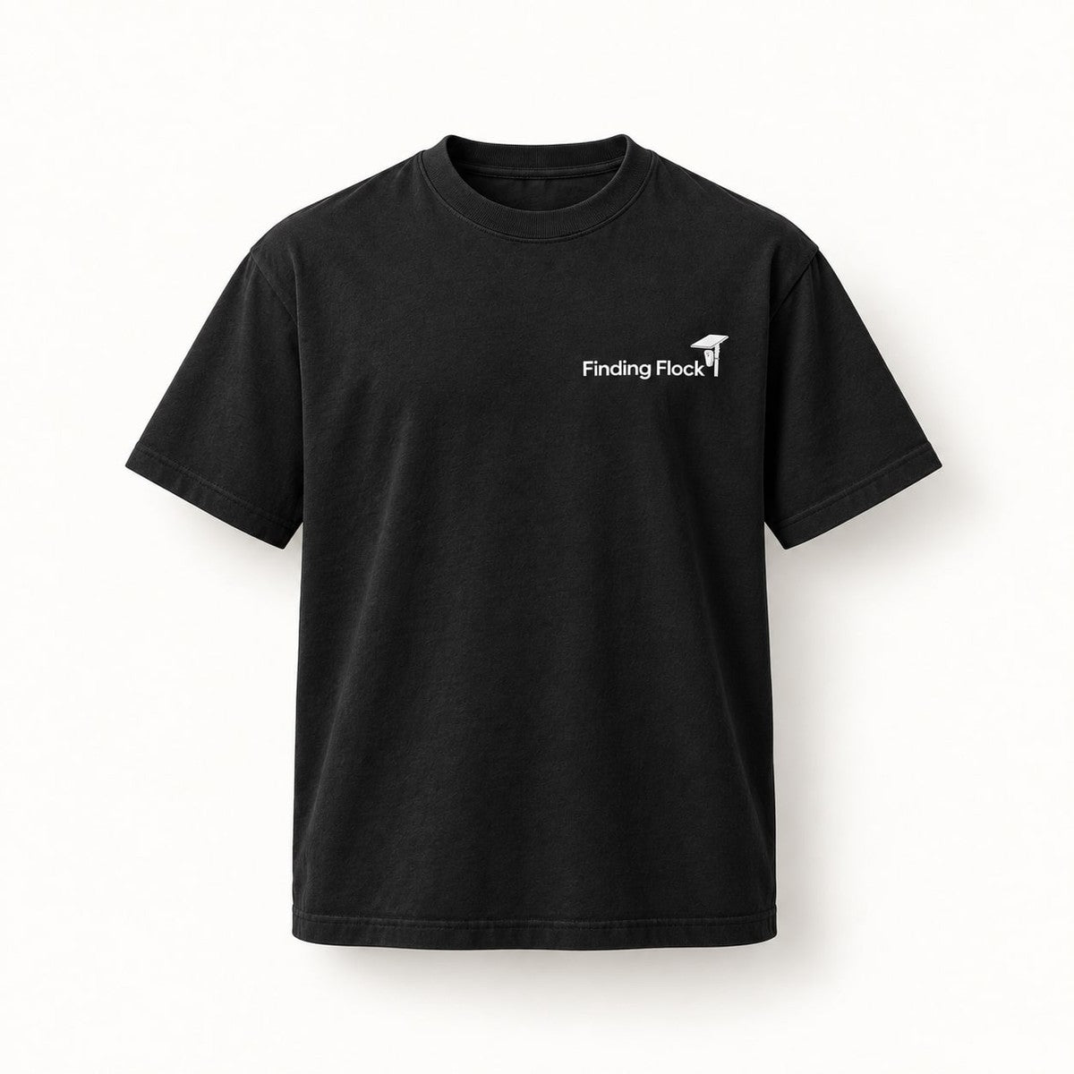 Deflock Halloween Part I Tee in Black, front of the shirt showing the small left-chest wordmark