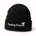 Finding Flock Wordmark Beanie in Black, the beanie standing upright