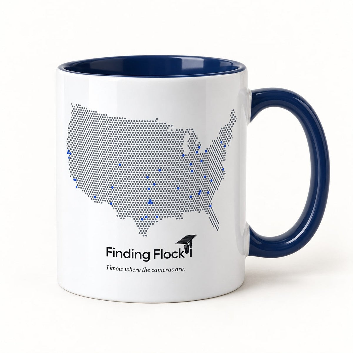 Finding Flock Accent Mug in Navy, the 11oz mug at a three-quarter angle