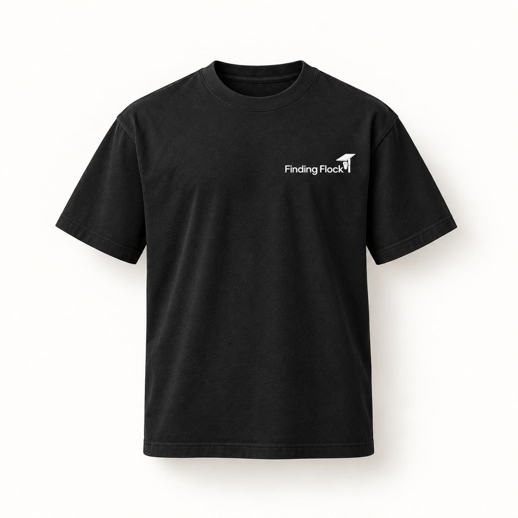 Deflock Halloween Part II Tee in Black, front of the shirt showing the small left-chest wordmark