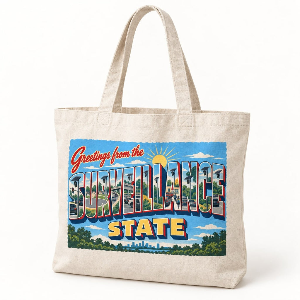 Greetings from the Surveillance State Tote Bag in Natural, the tote hanging flat